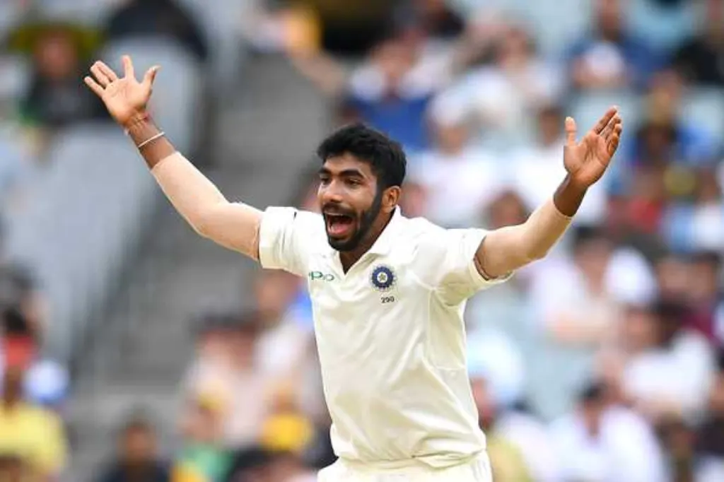 in a thrilling cricket showdown, jasprit bumrah takes the crucial wicket of steve smith after he scores a magnificent century, turning the tide of the match and showcasing his exceptional bowling skills.